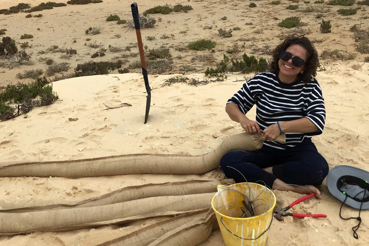 Malgana woman Bianca McNeair prepares snaggers for seagrass restoration at Shark Bay