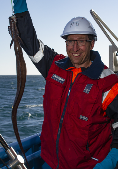 Dave Logan of Parks Australia with an eel