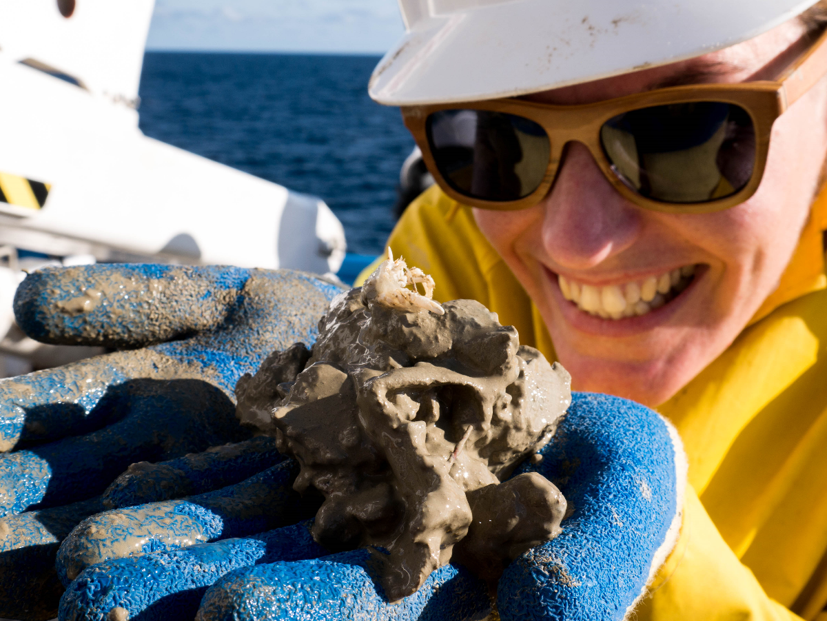 Lauren Hughes with a muddy crab