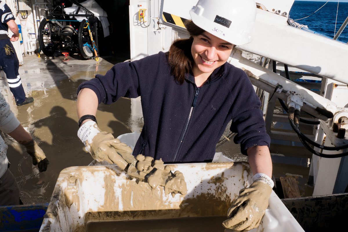 Maggie Georgieva sorting samples from mud