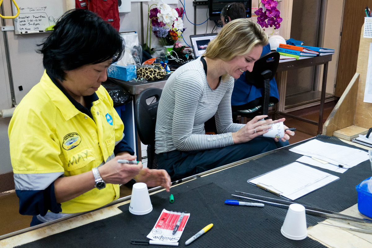 Maylene and Lauren decorating cups