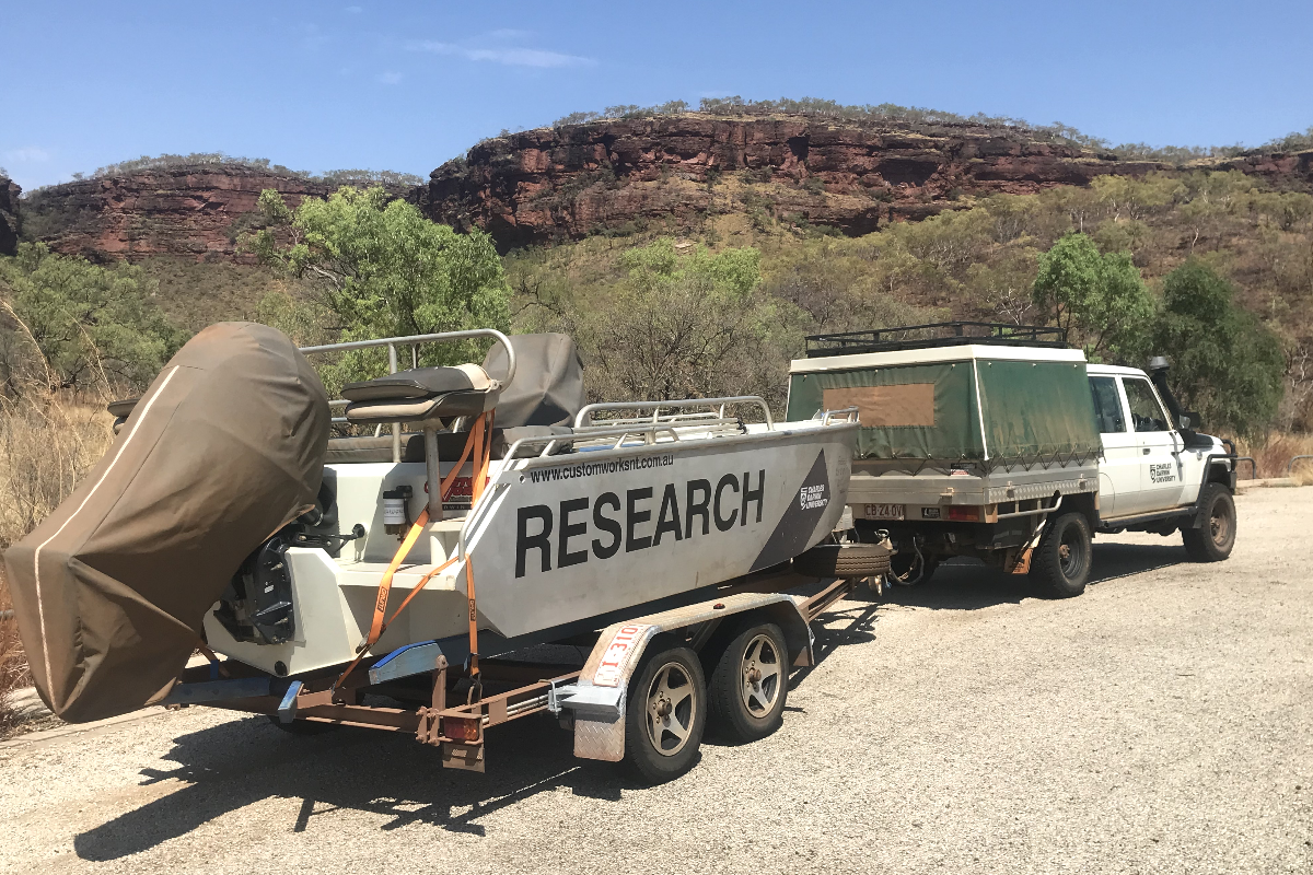 A research vessel on a trailer behind a ute