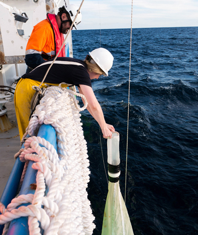 Phoebe Lewis and Mark Lewis with manta net