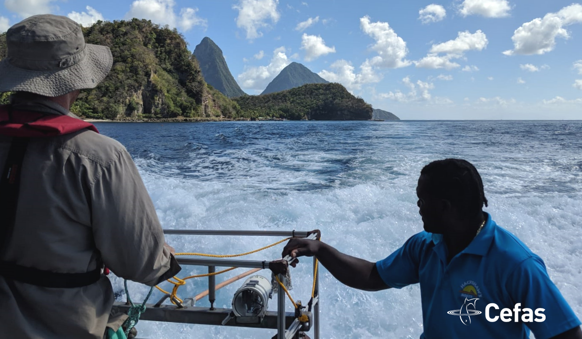 Scientists on a vessel near The Pitons