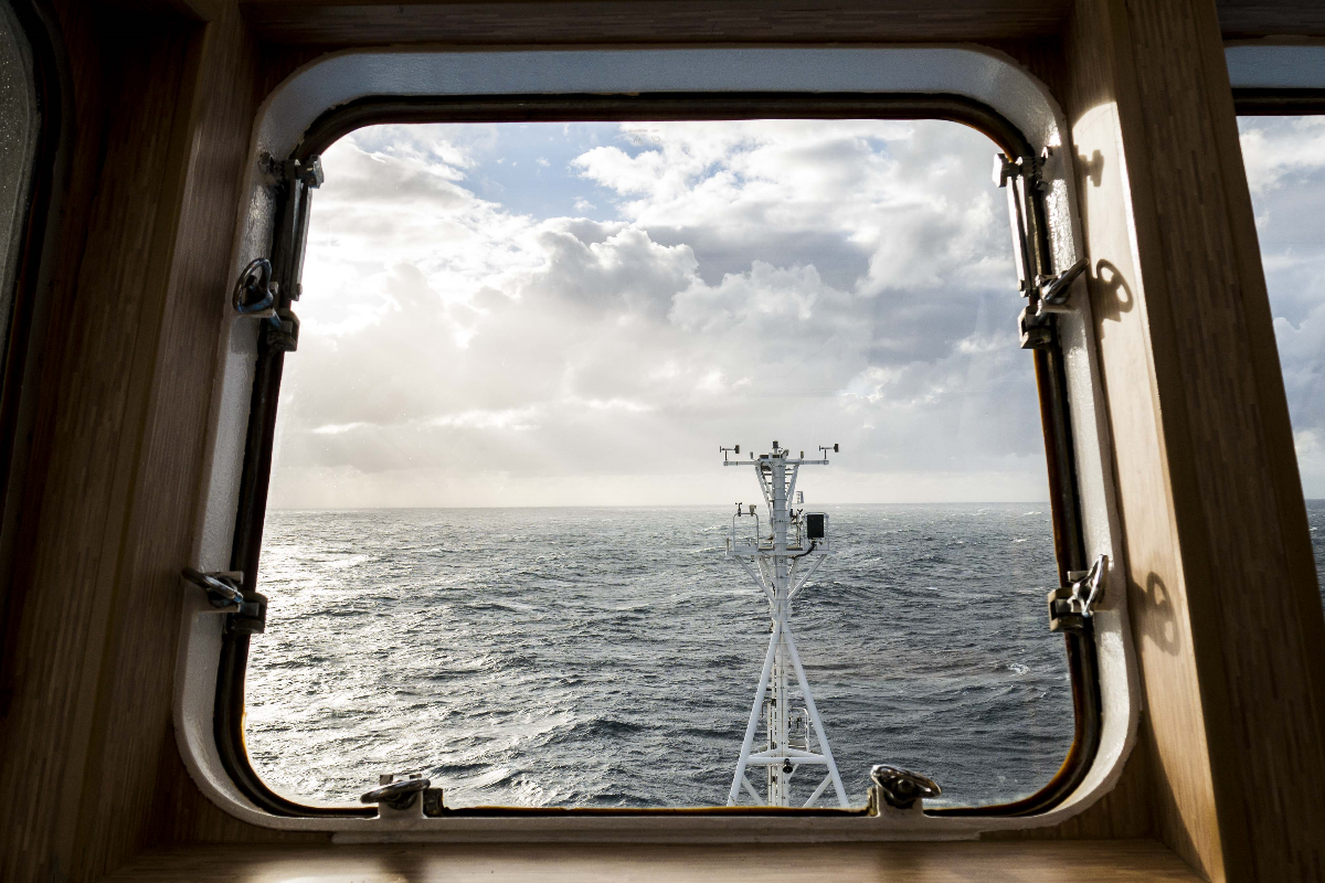 Ocean view through the window of the RV Investigator